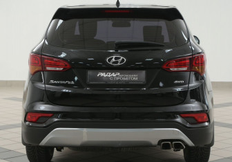 Подержанный автомобиль Hyundai Santa Fe 2016 года (3 фото)