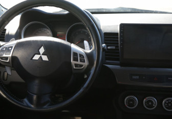 Подержанный автомобиль Mitsubishi Lancer Sedan 2008 года (14 фото)