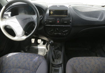 Подержанный автомобиль Fiat Brava 2001 года (12 фото)