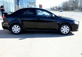 Подержанный автомобиль Mitsubishi Lancer Sedan 2008 года (7 фото)