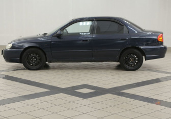 Подержанный автомобиль Kia Spectra Sedan 2007 года (7 фото)