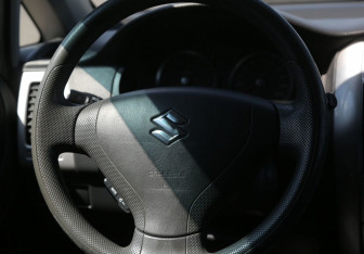 Подержанный автомобиль Suzuki Liana Wagon 2007 года (16 фото)