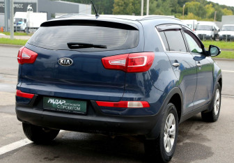 Подержанный автомобиль Kia Sportage 2013 года (6 фото)
