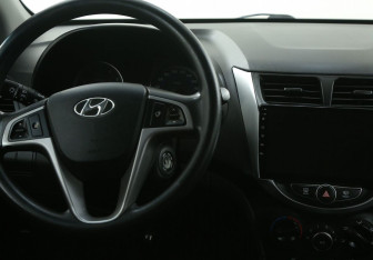 Подержанный автомобиль Hyundai Solaris Sedan 2014 года (14 фото)