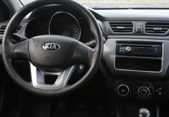 Подержанный автомобиль Kia Rio Hatchback 2014 года (14 фото)