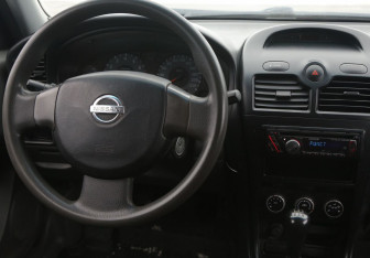 Подержанный автомобиль Nissan Almera Classic 2010 года (14 фото)