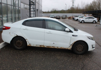 Подержанный автомобиль Kia Rio Sedan 2012 года (8 фото)