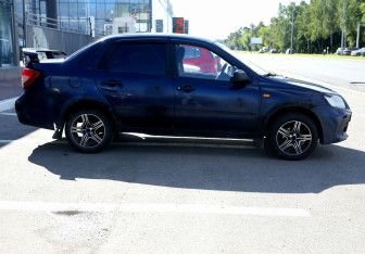 Подержанный автомобиль LADA (ВАЗ) Granta Sedan 2013 года (7 фото)