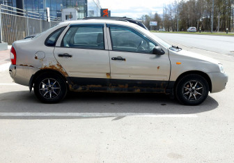 Подержанный автомобиль LADA (ВАЗ) Kalina Sedan 2006 года (7 фото)