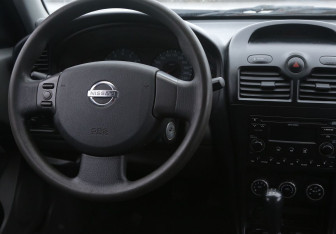 Подержанный автомобиль Nissan Almera Classic 2012 года (14 фото)