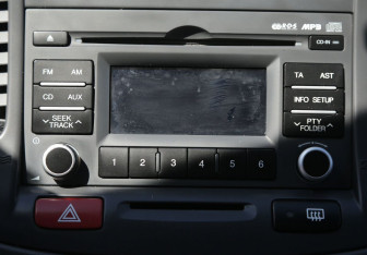 Подержанный автомобиль Kia Rio Hatchback 2011 года (15 фото)