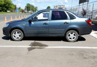 Подержанный автомобиль LADA (ВАЗ) Granta Sedan 2014 года (8 фото)