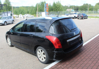 Подержанный автомобиль Peugeot 308 Wagon 2010 года (5 фото)