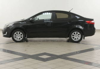 Подержанный автомобиль Kia Rio Sedan 2012 года (7 фото)