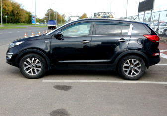 Подержанный автомобиль Kia Sportage 2014 года (8 фото)