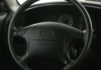 Подержанный автомобиль Kia Spectra Sedan 2008 года (16 фото)