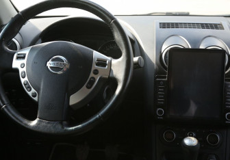 Подержанный автомобиль Nissan Qashqai+2 2011 года (14 фото)