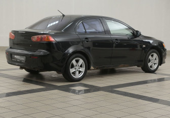 Подержанный автомобиль Mitsubishi Lancer Sedan 2008 года (4 фото)