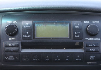 Подержанный автомобиль Toyota Corolla Sedan 2004 года (15 фото)