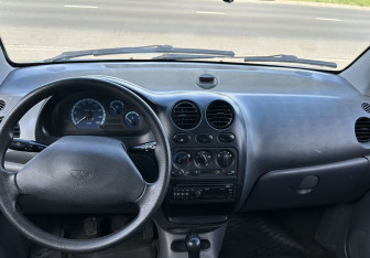 Подержанный автомобиль Daewoo Matiz 2012 года (9 фото)