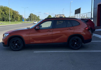Подержанный автомобиль BMW X1 2013 года (7 фото)