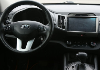 Подержанный автомобиль Kia Sportage 2013 года (14 фото)