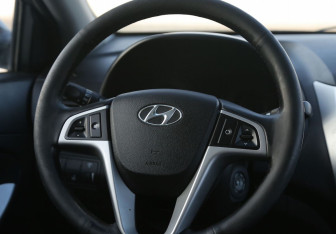 Подержанный автомобиль Hyundai Solaris Sedan 2013 года (16 фото)