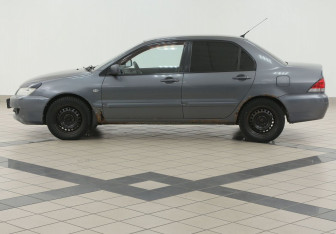 Подержанный автомобиль Mitsubishi Lancer Sedan 2006 года (7 фото)