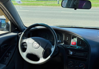 Подержанный автомобиль Hyundai Elantra Sedan 2008 года (14 фото)