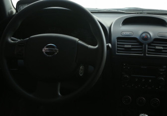 Подержанный автомобиль Nissan Almera Classic 2012 года (14 фото)