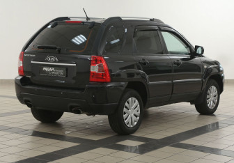 Подержанный автомобиль Kia Sportage 2010 года (4 фото)