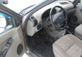 Подержанный автомобиль LADA (ВАЗ) Kalina Sedan 2011 года (10 фото)