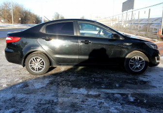 Подержанный автомобиль Kia Rio Sedan 2014 года (7 фото)