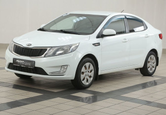Подержанный автомобиль Kia Rio Sedan 2013 года (8 фото)