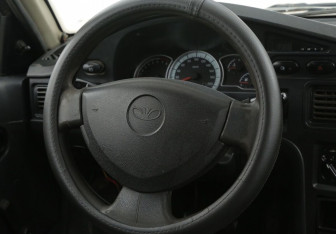 Подержанный автомобиль Daewoo Nexia Sedan 2014 года (16 фото)