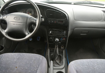 Подержанный автомобиль Kia Spectra Sedan 2007 года (12 фото)