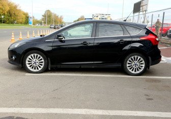 Подержанный автомобиль Ford Focus Hatchback 2014 года (8 фото)