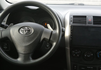 Подержанный автомобиль Toyota Corolla Sedan 2008 года (14 фото)