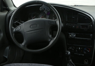 Подержанный автомобиль Kia Spectra Sedan 2007 года (14 фото)