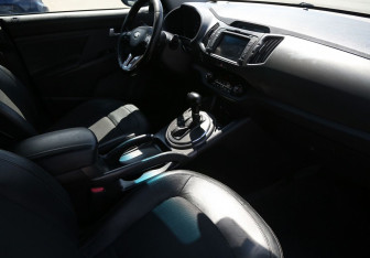 Подержанный автомобиль Kia Sportage 2012 года (11 фото)