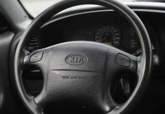 Подержанный автомобиль Kia Spectra Sedan 2007 года (16 фото)