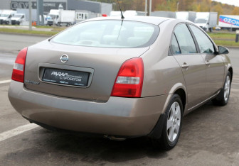 Подержанный автомобиль Nissan Primera Sedan 2004 года (6 фото)