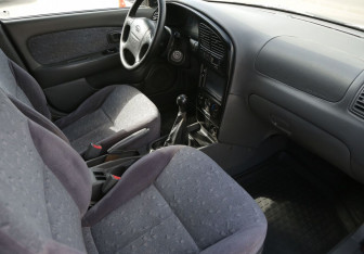 Подержанный автомобиль Kia Spectra Sedan 2007 года (9 фото)