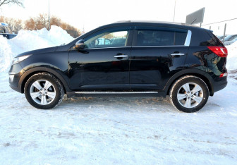 Подержанный автомобиль Kia Sportage 2010 года (8 фото)