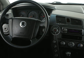 Подержанный автомобиль SsangYong Kyron 2011 года (14 фото)