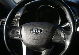 Подержанный автомобиль Kia Rio Sedan 2013 года (17 фото)