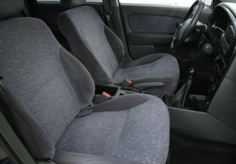 Подержанный автомобиль Kia Spectra Sedan 2007 года (10 фото)