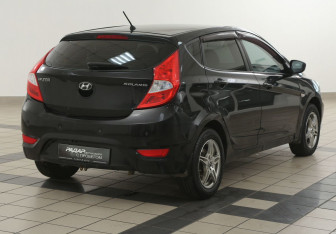 Подержанный автомобиль Hyundai Solaris Hatchback 2011 года (4 фото)