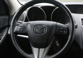 Подержанный автомобиль Mazda 3 Hatchback 2009 года (16 фото)