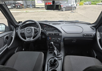 Подержанный автомобиль Chevrolet Niva 2011 года (13 фото)